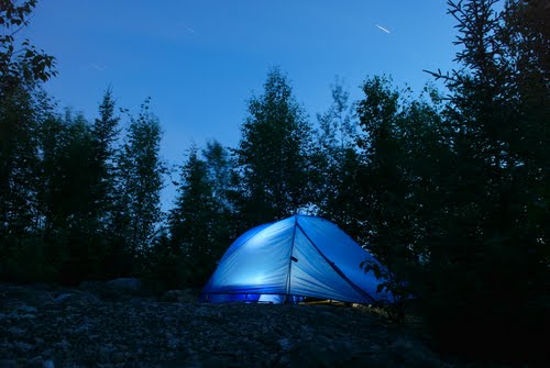 Reading in the tent at night